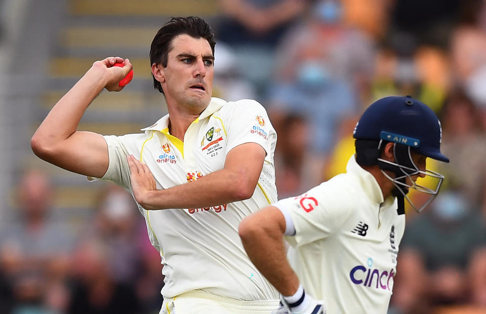 Seen here, Australian captain Pat Cummins gets set to bowl at England on day two in Hobart.