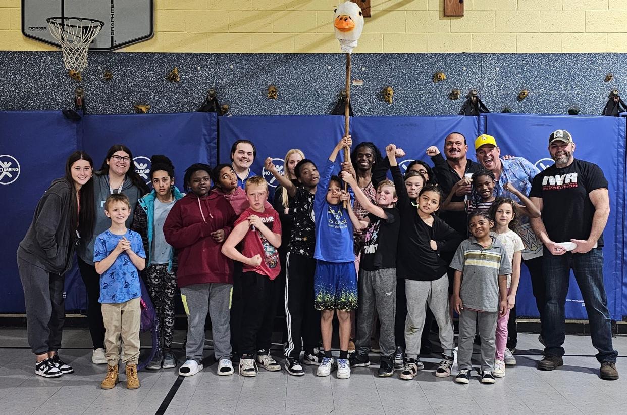 IWR wrestlers Terrance Gerin, WWE superstar better known as Rhyno/Rhino, Kenny Urban with Goose and Gary Pillette recently attended an afterschool program at Arborwood North Elementary School to talk about wrestling careers.