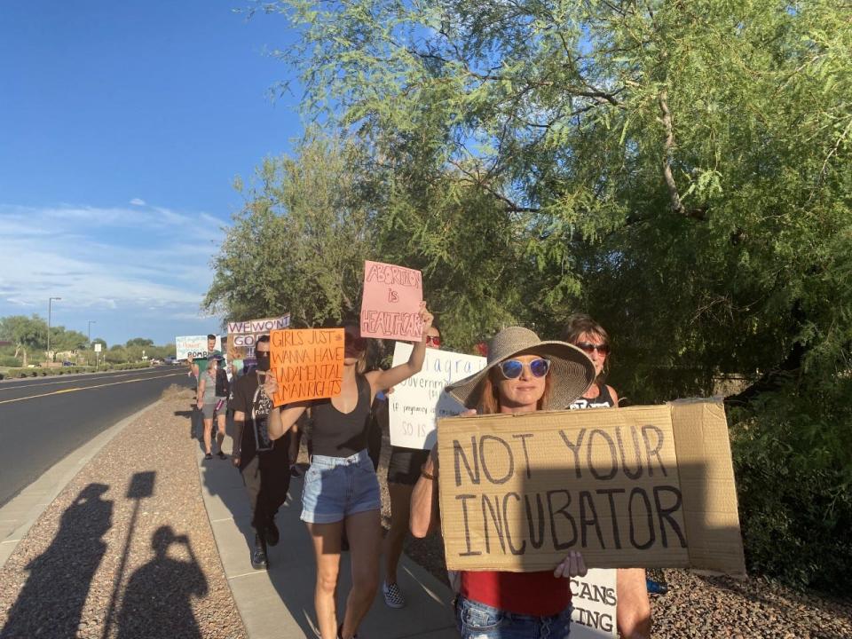 Hundreds of people gathered in the parking lot of Anthem Community Center on Saturday evening, July 9, 2022, to march in protest of the Supreme Court's decision to overturn Roe v. Wade.