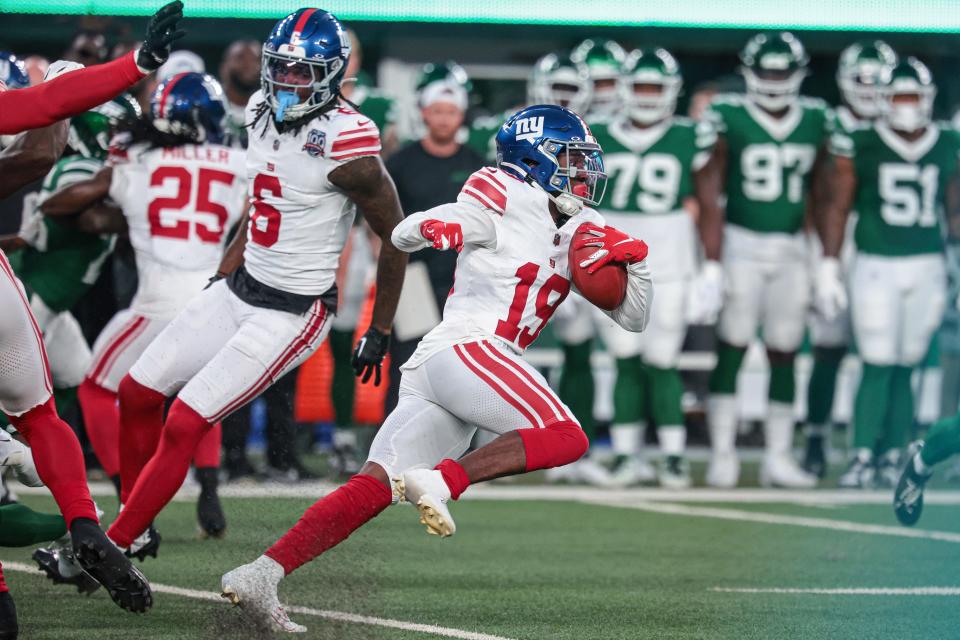 Aug 24, 2024; East Rutherford, New Jersey, USA; New York Giants wide receiver Ayir Asante (19) returns a kickoff during the first quarter against the New York Jets at MetLife Stadium. Mandatory Credit: Vincent Carchietta-USA TODAY Sports