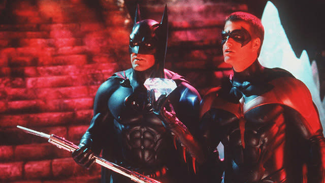 Long before Christopher Nolan left his mark on the Batman franchise with the hugely successful <em>Dark Knight</em> trilogy, there was the 1989 film series first directed by Tim Burton and later taken over by Joel Schumacher. These four films -- <em>Batman</em>, <em>Batman Returns</em>, <em>Batman Forever</em>, and <em>Batman & Robin -- </em>featured a largely gothic and camp version of the caped crusader, which was a reflection of the comic book movies at the time. Each film topped the last, with <em>Forever -- </em>released 20 years ago on June 16, 1995 -- collecting $350 million at the box office, earning three Academy Award nominations, and making international stars out of Val Kilmer and Chris O’Donnell, Batman and Robin respectively. The film also featured Nicole Kidman, Drew Barrymore, and Jim Carrey at crossroads in their careers and the already popular Tommy Lee Jones. <strong>WATCH: A Look Back at Batman on Film Through the Years</strong> But the franchise came to a screeching halt after the fourth film starring George Clooney was met with dismal reviews in large part to its extremely campy approach. Batman, and subsequent Robin films, was no more. Ahead of <em>Forever</em>’s 20th anniversary in theaters, O’Donnell talked to ETonline about what it meant to play Robin at the time, working with both Kilmer and Clooney, and what went wrong with the franchise. <strong>ETonline: What did the film mean to you at the time? You were only 25 when you first got involved in the franchise. </strong> <strong>Chris O’Donnell: </strong>It was interesting. I remember sitting in the back of a limousine being driven somewhere and my agent asking, “Are you going to do this or not?” I remember thinking, “My god, it seemed like a no-brainer. I grew up watching Batman and how could you not? But at the same time, I knew what a huge thing it was. Do I want to be a part of this? Do I want to be known as Robin?” I remember sitting in the car and going, “What am I going to do?" And I was like, “I’m in. I’m going to do it!” I had a great time working with Joel [Schumacher]. The cast was amazing. The spectacle of the whole thing -- these sets, the money they spent to build it -- I had never seen anything like it in my life. To be the kid who had all the toys growing up and played Batman and Robin as a kid to now get to drive the Batmobile and run around in these costumes, it was a joke. I couldn’t believe they were paying me. <strong>Speaking of driving the Batmobile, that scene featured a cameo by En Vogue. Did you know who the group was at the time? </strong> No, I had no idea. I mean, I knew the name but I had no idea really. <strong>You mentioned the great cast. The film featured a lot of great actors at different points in their careers, but all largely on the way up. </strong> It was great. I had just worked with Drew [Barrymore] on <em>Mad Love</em> so I was real friendly with her. Nicole was terrific. I didn’t know her really well because she was married to Tom [Cruise] at the time and they were just kind of in their own world. Jim Carrey had most of his scenes with Tommy Lee, who I had worked with before so I knew him. I had most of my stuff with Val [Kilmer] and Val is an incredible actor. He can be a strange guy and not always a friendly guy, but a terrific actor -- and I thought he was great as Batman. If I’m going to hang with the Batman, I’m probably going to hang with George [Clooney, who took over the role in <em>Batman & Robin</em>]. Warner Bros. <strong>Of course, <em>Forever</em> and the sequel got a lot of attention at the time for the costumes. </strong> Especially the second one! My god, I look at some of the photos now. Joel was really having his way, knowing how he wanted these costumes done. <strong>What was it like to wear the suit? </strong> For me, I had to wear that little mask that was glued. First thing in the morning they painted my eyes black and then would glue the mask on [to my face]. It was so hot, you would touch the mask and water would just run down your face. During the first one, we didn’t get in and out of costumes a lot because it was too complicated. But the second, we had a whole system set up. I had two people full time that just got me in and out of my suit. And if it was going to be more than a little while between takes I got out of my suit and got a fresh under suit. That was the biggest challenge to be honest with you. <strong>You mentioned to Conan O’Brien that you still have it in a crate somewhere. </strong> I do! It’s down in the basement. <strong>Is that like a museum piece now? </strong> No. It’s in a wood crate. Honestly, my kids have never seen it. They’re like, “When are you going to open that thing?” And I go, “When I find a screwdriver.” It may have decomposed in there for all I know. <strong><em>Forever</em> and the sequel get a bad rap. Joel even apologized at one point. Even though it’s campy, <em>Forever</em> is a fun film. </strong> I thought <em>Forever</em> was terrific. I really thought it was well made. With <em>B</em> <em>atman & Robin</em>, I think Warner Bros. got piggy. It was too soon. If I remember correctly, it wasn’t too far after <em>The Fugitive</em> came out. And if I remember correctly, <em>The Fugitive</em> was kind of a mess when they were making it but they figured it out and it was a huge hit. And I think for a while, Warner Bros. was like, “It doesn’t matter. We can throw enough money at it and it’ll be a huge hit.” There needs to be a certain amount of time before people had the appetite, “I need another <em>Batman</em>.” We had just finished and all of a sudden it was, like, boom here’s another one. There was a lot of waste. I felt it wasn’t tight and it wasn’t thought out. People just got greedy. That being said, I had a great time doing it. Warner Bros. <strong>You previously revealed that there was going to be a spin-off for Robin, but that didn’t end up happening. </strong> Yeah there was at one point: <em>Nightwing</em>. When the reviews came out on <em>Batman & Robin,</em> that was shut down immediately. This has been a great opportunity for me and I’m not going to look a gift horse in the mouth. It was an amazing opportunity and gave me incredible international exposure. And everyone dealt with it differently. Some people became very reclusive about it and freaked out by it. I thought George handled it great. He was like, “Well, we killed the franchise,” and funny about it. For me, I will always look back with fond memories. But of course, I’m not as proud of the second one as I was of the first one. <strong>Do you have a favorite memory from making the movie? </strong> I was making <em>Mad Love</em> and I flew down from Seattle to Burbank. They had an entire warehouse for the costumes and these artisans from England had come in. They put me in body molds. The artistry of making these suits -- just watching the whole process was just amazing. <strong>Have your children seen <em>Batman Forever</em> or your other films? </strong> They’ve seen the Batman films and <em>The</em> <em>Three Musketeers</em>. The majority of films I’ve been in they’ve never seen. It’s actually kind of fun -- I’m lying on the couch with them, flipping channels and I’ll see a movie I’ve been in they’ve never seen and I’ll just leave it on. They’re like, “Dad seriously what is this? Why are we watching this?!” And then they’ll see me and go, “Is that you?!” They start to watch it and I explain it to them. My oldest daughter has seen a couple of films, but they’ve never seen <em> Scent of a Woman</em> or any of that stuff.