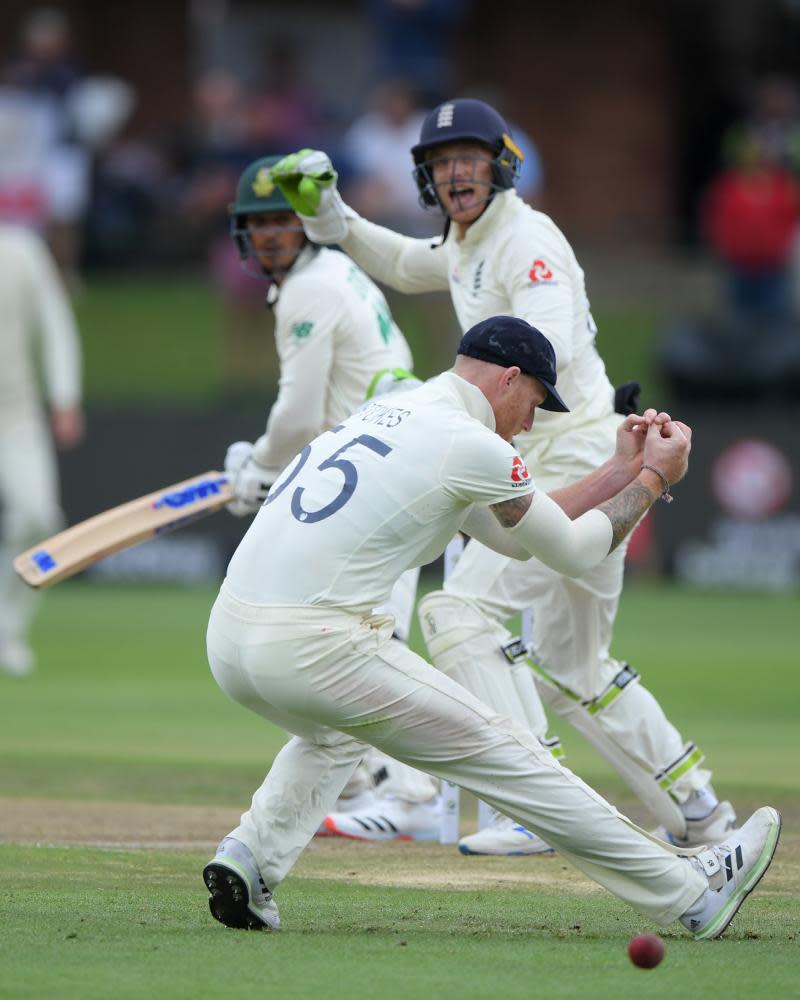 Quinton de Kock, who ended the day on 63 for South Africa, is dropped at slip by Ben Stokes as wicketkeeper Jos Buttler looks on.