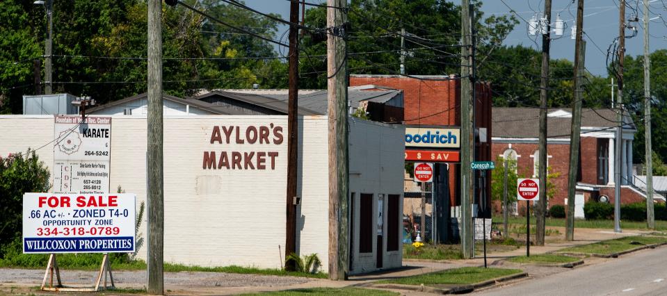 Properties for sale dot the neighborhood along Maxwell Boulevard, across from Montgomery Whitewater, in Montgomery, Alabama, on June 28, 2023.