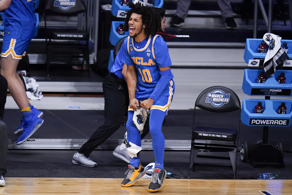 UCLA guard Tyger Campbell (10) reacts to a play against Alabama in the first half of a Sweet 16 game in the NCAA men's college basketball tournament at Hinkle Fieldhouse in Indianapolis, Sunday, March 28, 2021. (AP Photo/Michael Conroy)