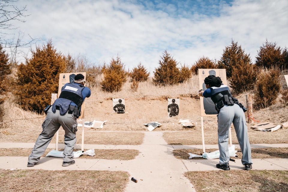 Two students during firearms training at a shooting range in Missouri on March 6<span class="copyright">Joe Martinez for TIME</span>