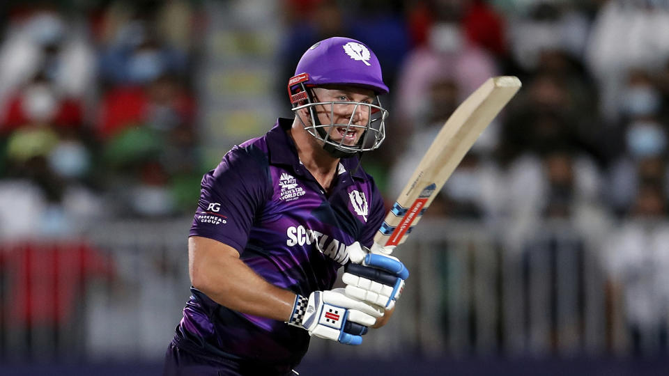 FILE - Scotland's batsman George Munsey reacts during the Cricket Twenty20 World Cup first round match between Bangladesh and Scotland in Muscat, Oman, Sunday, Oct. 17, 2021. Munsey scored 66 from just 53 deliveries in their match against the West Indies in Hobart,Australia, Monday Oct. 17, 2022. (AP Photo/Kamran Jebreili,File)