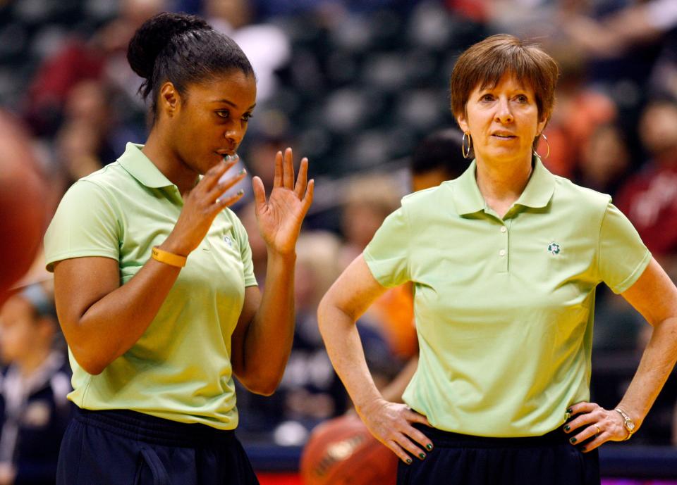 Niele Ivey, shown here with Muffet McGraw at the 2011 Final Four in Indianapolis, is a former player and longtime assistant coach at Notre Dame. She became coach of the Irish in 2020, when McGraw stepped down.