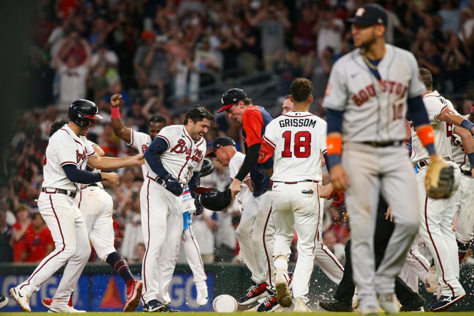 Astros first baseman Yuli Gurriel leaves the field after the Braves' walk-off win on Saturday.