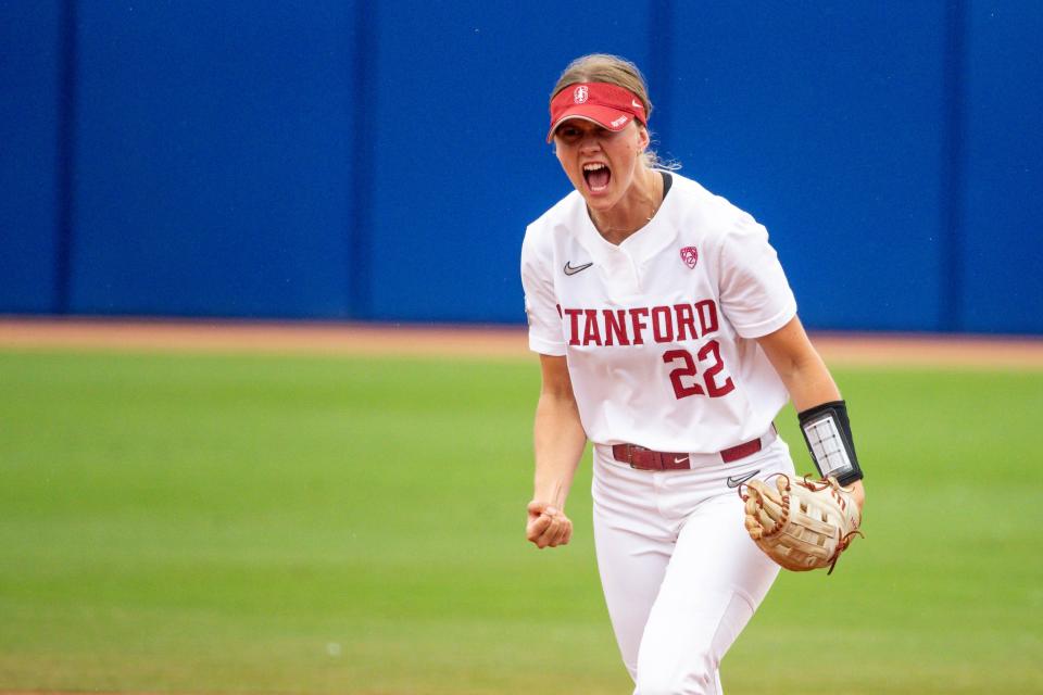 Stanford infielder River Mahler (22) celebrates during a softball game between Stanford and Washington at the Women's College World Series at USA Softball Hall of Fame Stadium in in Oklahoma City on Sunday, June 4, 2023.