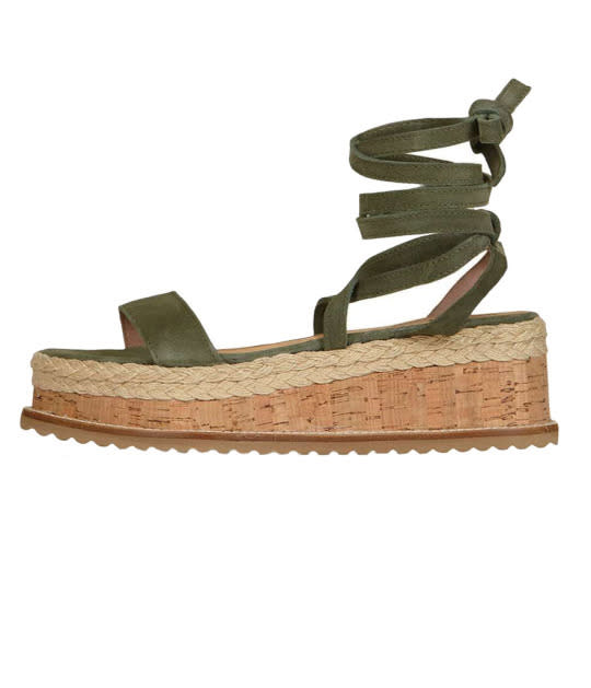 <p>Funfair Knotted Sandals, $75, <a href="http://us.topshop.com/en/tsus/product/shoes-70484/funfair-knotted-sandals-5488851?bi=40&ps=20" rel="nofollow noopener" target="_blank" data-ylk="slk:topshop.com;elm:context_link;itc:0;sec:content-canvas" class="link ">topshop.com</a></p>