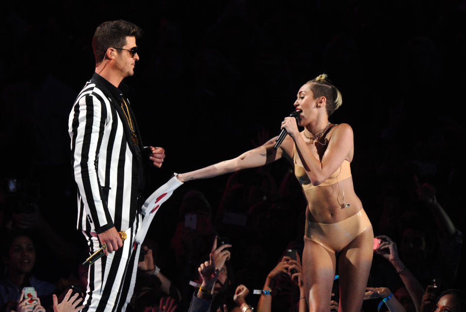 Robin Thicke, left, and Miley Cyrus perform "Blurred Lines" at the MTV Video Music Awards on Sunday, Aug. 25, 2013, at the Barclays Center in the Brooklyn borough of New York. (Photo by Charles Sykes/Invision/AP)