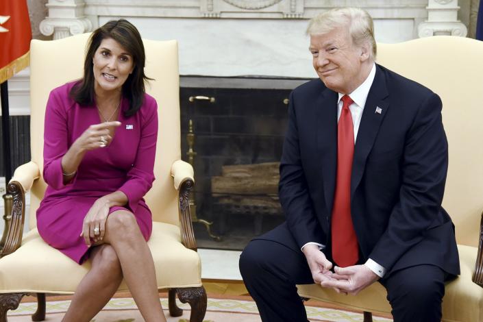 US President Donald Trump meets with Nikki Haley, the United States Ambassador to the United Nations in the Oval office of the White House on October 9, 2018 in Washington, DC.