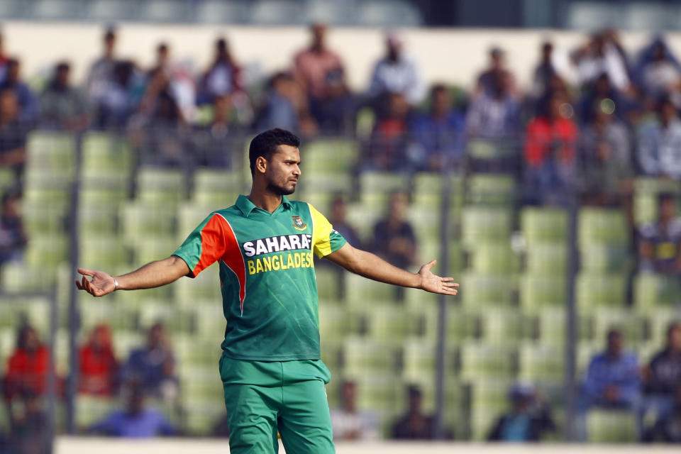 Bangladesh’s Mashrafe Mortaza reacts after he missed a catch during their second one-day international (ODI) cricket match against Sri Lanka in Dhaka, Bangladesh, Thursday, Feb. 20, 2014. (AP Photo/A.M. Ahad)