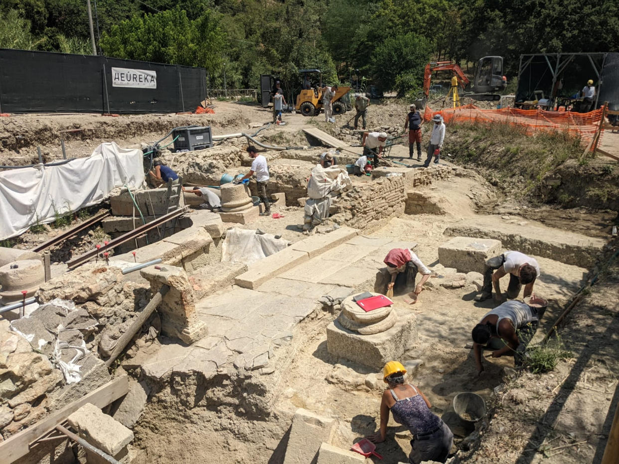 Archaeologists work at the site of the discovery of two dozen well-preserved bronze statues from an ancient Tuscan thermal spring in San Casciano dei Bagni, central Italy, in this update photo made available by the Italian Culture Ministry, Friday, July 29, 2022. (Italian Culture Ministry via AP)