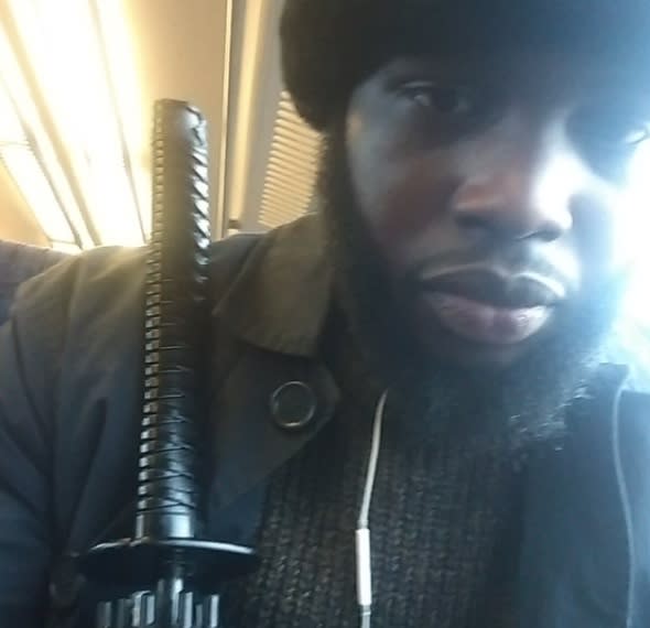 Panicked train passengers mistake man's umbrella for Samurai sword