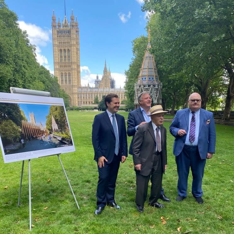 MP Robert Jenrick with holocaust survivors outside Houses of Parliament in Westminster on July 29.  (Robert Jenrick/Twitter )