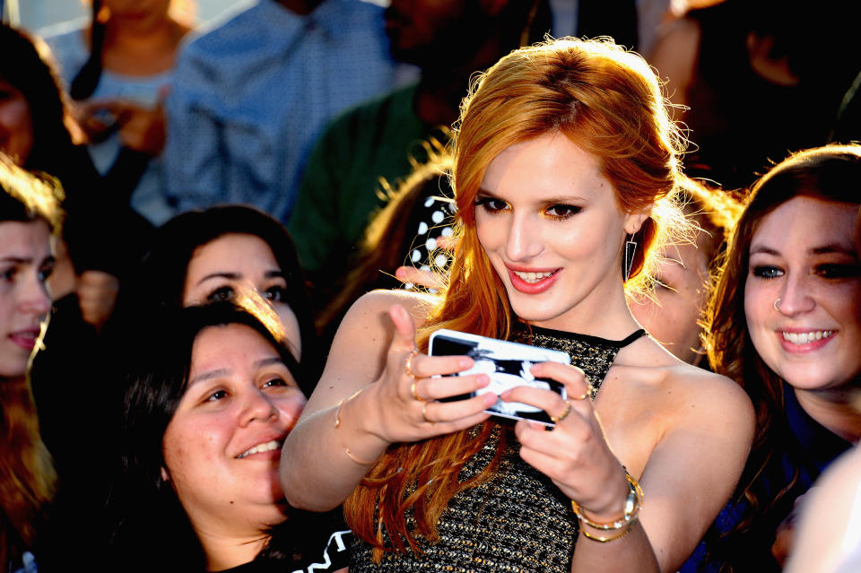 LOS ANGELES, CA - MARCH 18:Actress Bella Thorne arrives at the premiere Of Summit Entertainment's 'Divergent' at Regency Bruin Theatre on March 18, 2014 in Los Angeles, California.  (Photo by Frazer Harrison/Getty Images)