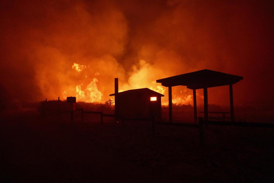 The Post fire advances on structures in Gorman.