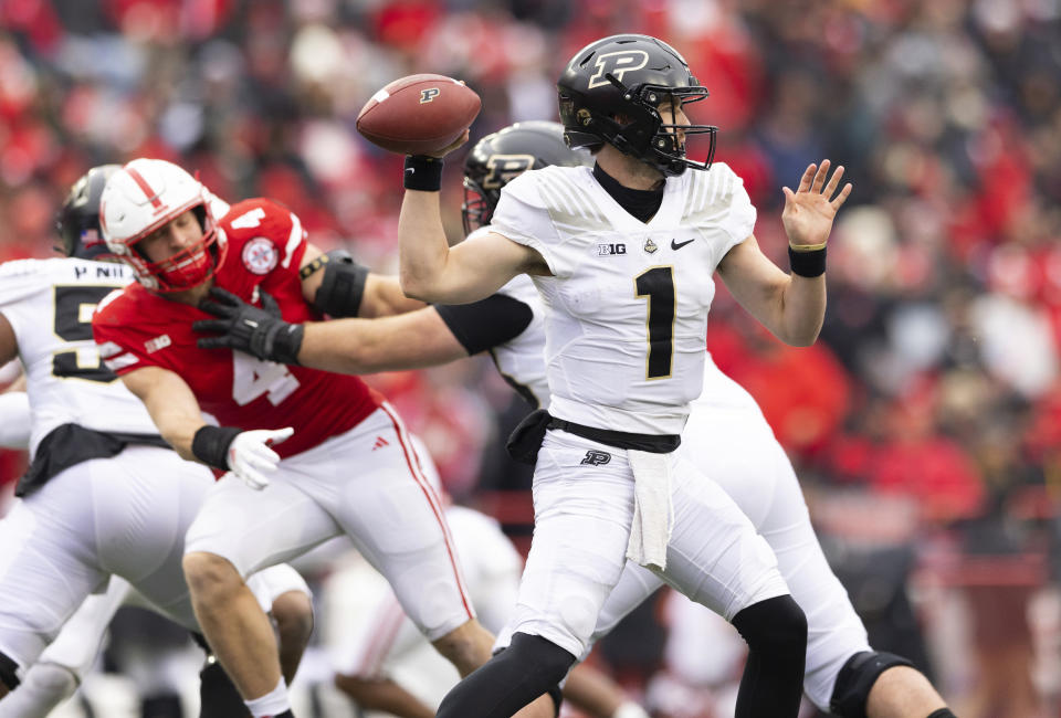 Purdue quarterback Hudson Card (1) passes the ball against Nebraska during the first half of an NCAA college football game Saturday, Oct. 28, 2023, in Lincoln, Neb. (AP Photo/Rebecca S. Gratz)