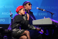 <p>Another virtuosic musical talent, Monae, showed Wonder some love at his "Key of Life" Award expo in L.A. in 2017.</p>