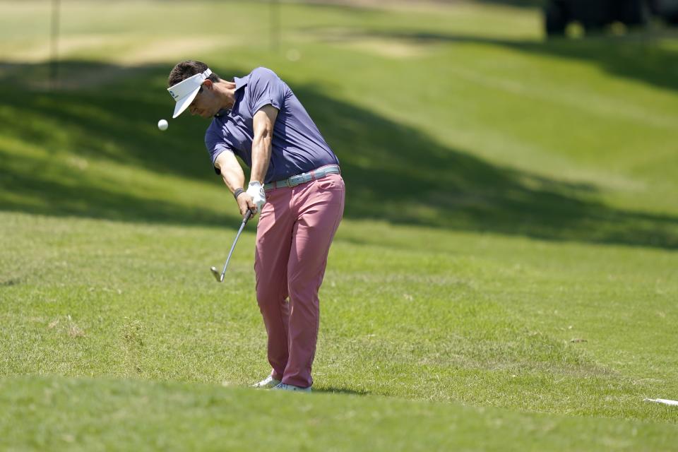 Beau Hossler hits off the 18th fairway during the second round of the Charles Schwab Challenge golf tournament at the Colonial Country Club, Friday, May 27, 2022, in Fort Worth, Texas. (AP Photo/LM Otero)