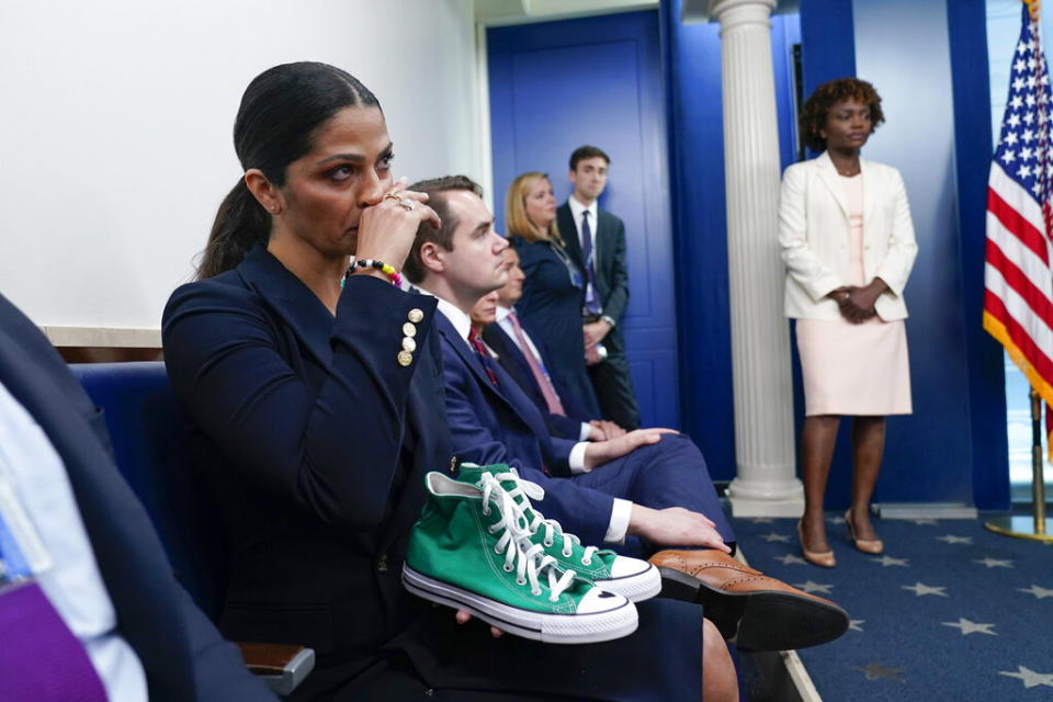 Camila Alves McConaughey holds the lime green Converse tennis shoes that were worn by Uvalde shooting victim Maite Yuleana Rodriguez, 10, as Matthew McConaughey, a native of Uvalde, Texas, speaks at the White House. - Credit: (AP Photo/Susan Walsh)