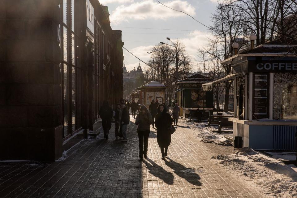 People walk along a street on a sunny day in downtown Kyiv, on Jan. 12, 2024, amid the Russian invasion of Ukraine. (Roman Pilipey/AFP via Getty Images)