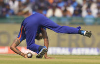 India's Hardik Pandya takes the catch of New Zealand's Devon Conway on his own bowling during the second one-day international cricket match between India and New Zealand in Raipur, India, Saturday, Jan. 21, 2023. (AP Photo/Aijaz Rahi)