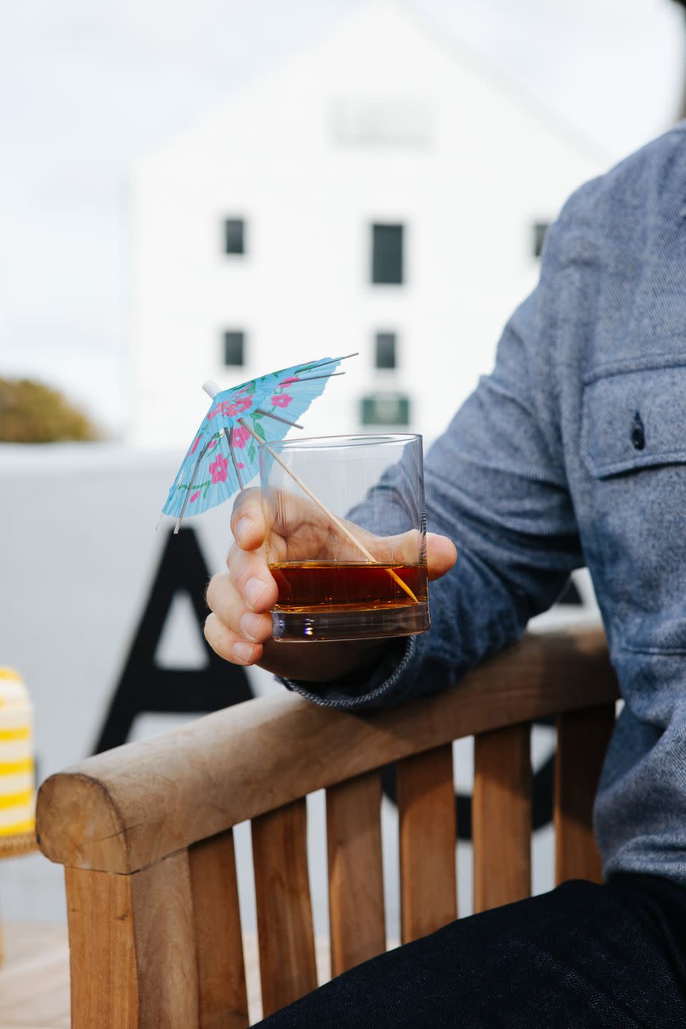 a person holding a cup of coffee