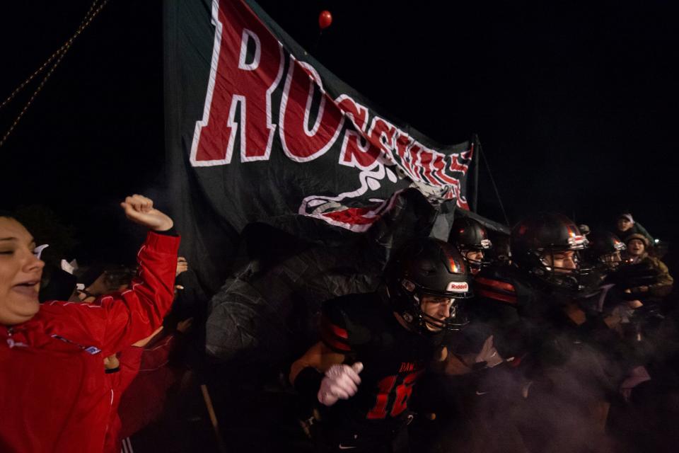 Rossville runs onto the field for their Sub-State match against Silver Lake.