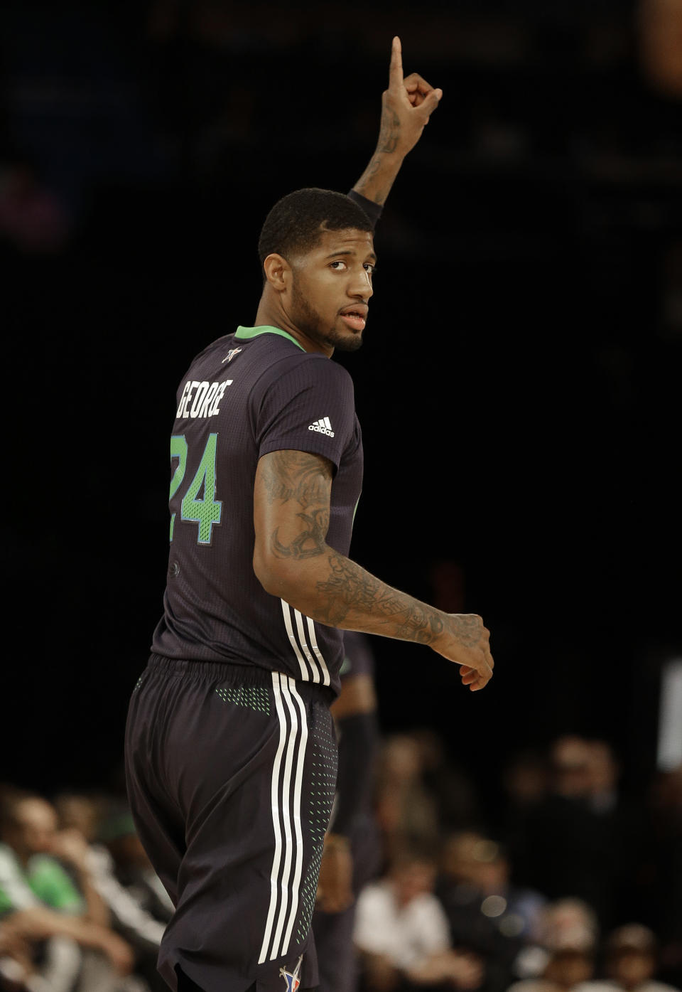 West Team's Paul George of the Indian Pacers (24) moves down the court during the NBA All Star basketball game, Sunday, Feb. 16, 2014, in New Orleans. (AP Photo/Gerald Herbert)