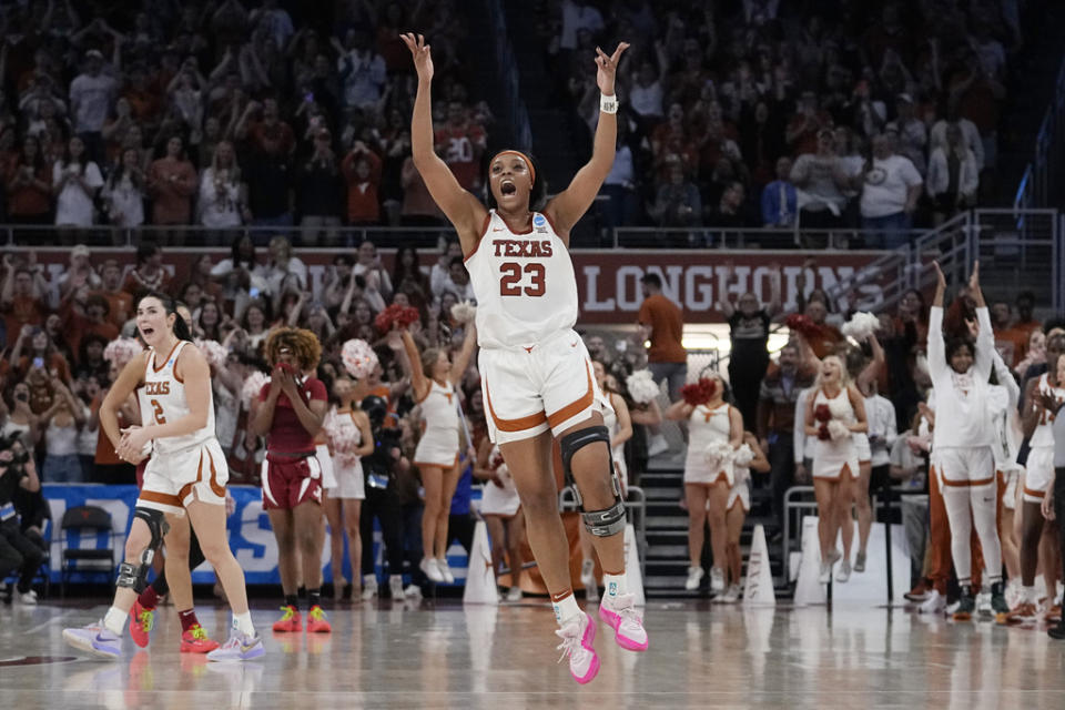 Texas forward Aaliyah Moore (23) celebrates after the team’s win over Alabama in a second-round college basketball game in the women’s NCAA Tournament in Austin, Texas, Sunday, March 24, 2024. (AP Photo/Eric Gay)