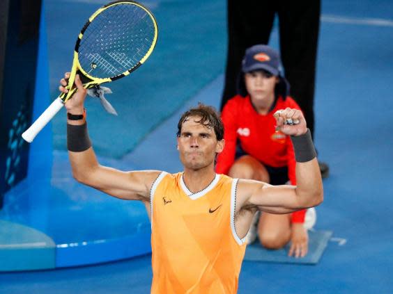 Nadal celebrates his straight-sets victory over De Minaur (Getty)