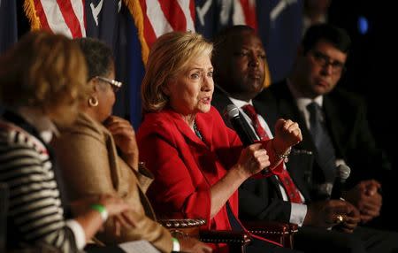 U.S. Democratic presidential candidate Hillary Clinton speaks as she is surrounded by local mayors in West Columbia, South Carolina July 23, 2015. REUTERS/Chris Keane