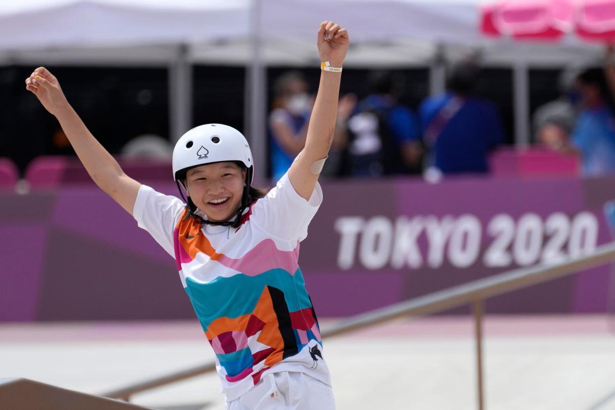 Momiji Nishiya of Japan reacts after winning the women's street skateboarding finals at the 2020 Summer Olympics, Monday, July 26, 2021, in Tokyo, Japan.