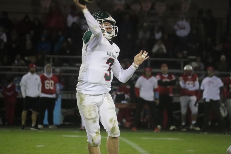 Oak Harbor's Mike LaLonde throws a pass.