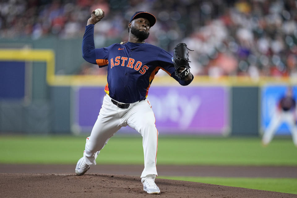Houston Astros starting pitcher Cristian Javier delivers during the first inning of a baseball game against the Texas Rangers Sunday, April 14, 2024, in Houston. (AP Photo/Kevin M. Cox)