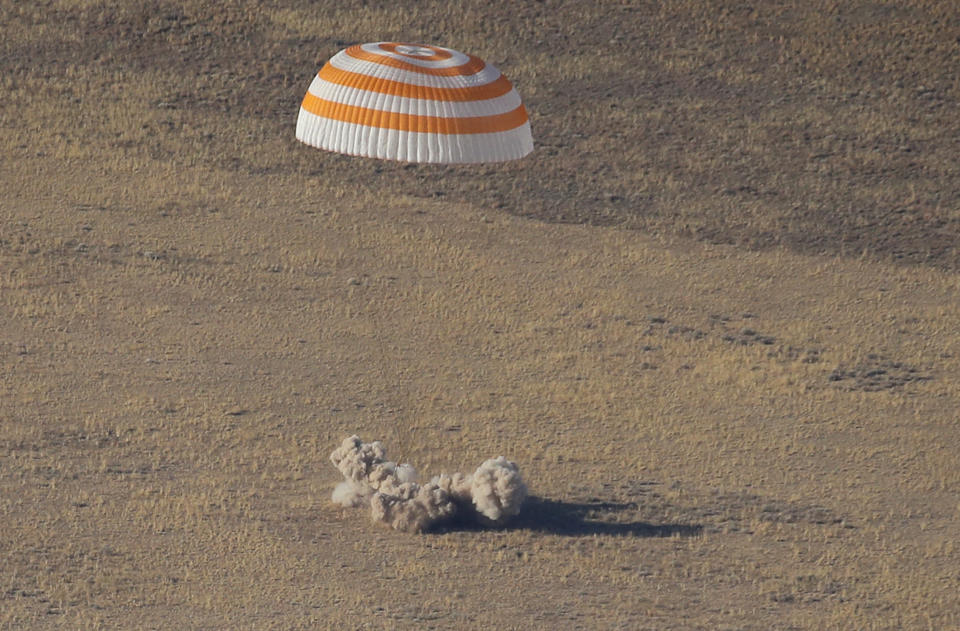 The Russian Soyuz MS-12 space capsule lands about 150 km (90 miles) south-east of the Kazakh town of Zhezkazgan, Kazakhstan, Thursday, Oct. 3, 2019. A Soyuz space capsule with U.S. astronaut Nick Hague, Russian cosmonaut Alexey Ovchinin and United Arab Emirates astronaut Hazzaa Ali Almansoori, returning from a mission to the International Space Station landed safely on Thursday on the steppes of Kazakhstan. (AP Photo/Dmitri Lovetsky, Pool)