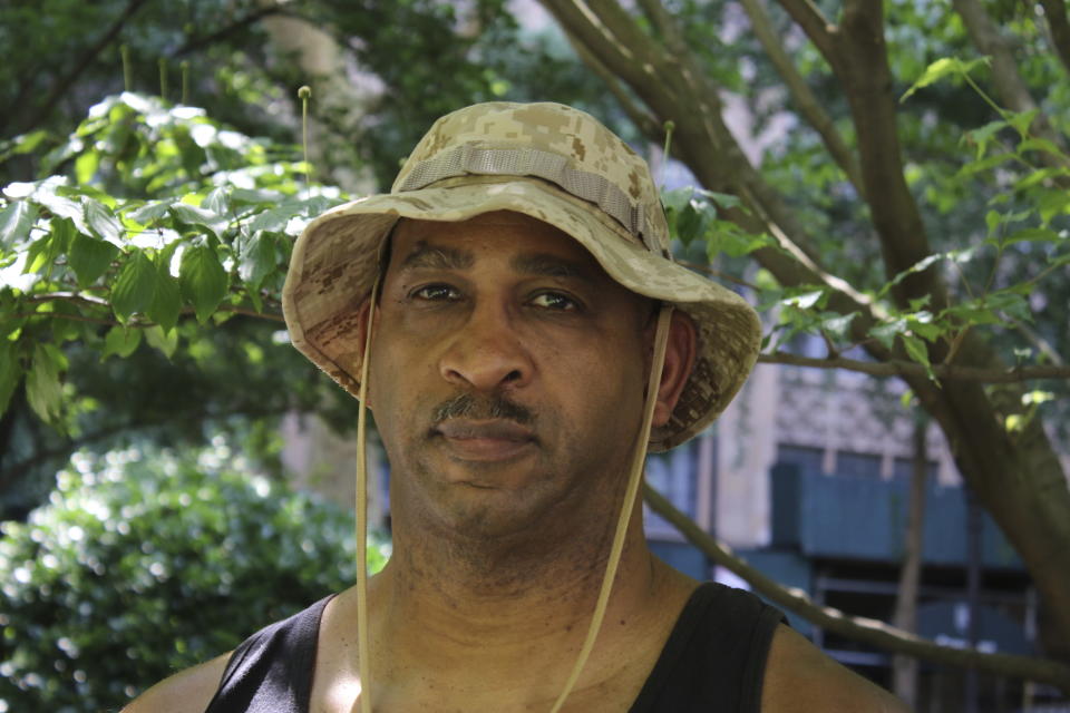 Lloyd Murphy, 65, also known as "Topaz 1", poses for a photo in New York on July 5, 2023. Before it was a global movement, it was simply an expression of life and struggle: a culture that was synonymous with hardship and suffering, but also grit, resilience and creativity. “It was a way to feel like we mattered,” said Lloyd Murphy, who tagged his name as “Topaz1." “We saw New York City and the trains going by as a billboard to put your name on and say, ‘I’m somebody.’” (AP Photo/Noreen Nasir)