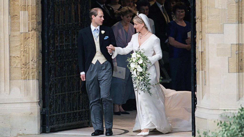  Duke and Duchess of Edinburgh standing in doorway to church after getting married. 