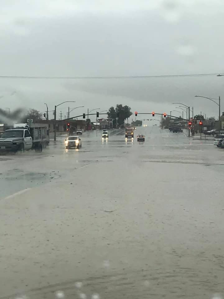 Water and debris floods Twentynine Palms Highway in downtown Joshua Tree, between Sunburst and Hallee roads during the Valentine's Day floods in 2019. The Colorado Desert is expected to see similar amounts of rain this weekend as Hurricane Hilary arrives in the area as a tropical storm.