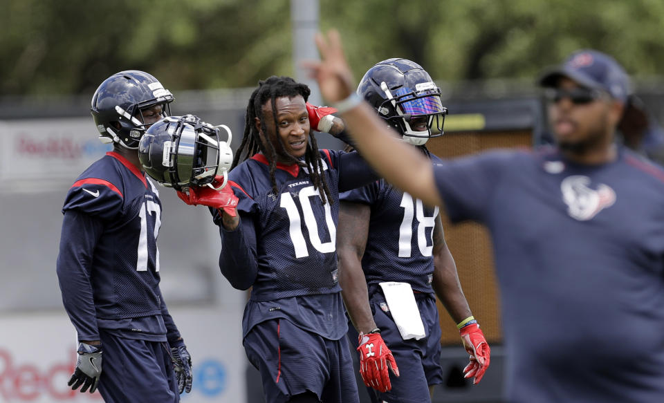 Houston Texans receiver DeAndre Hopkins (C) and San Francisco 49ers corner Jimmie Ward got into a fight at practice on Wednesday. (AP)