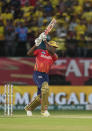 Punjab Kings' Kagiso Rabada plays a shot during the Indian Premier League cricket match between Chennai Super Kings and Punjab Kings in Dharamshala, India, Sunday, May 5, 2024. (AP Photo /Ashwini Bhatia)