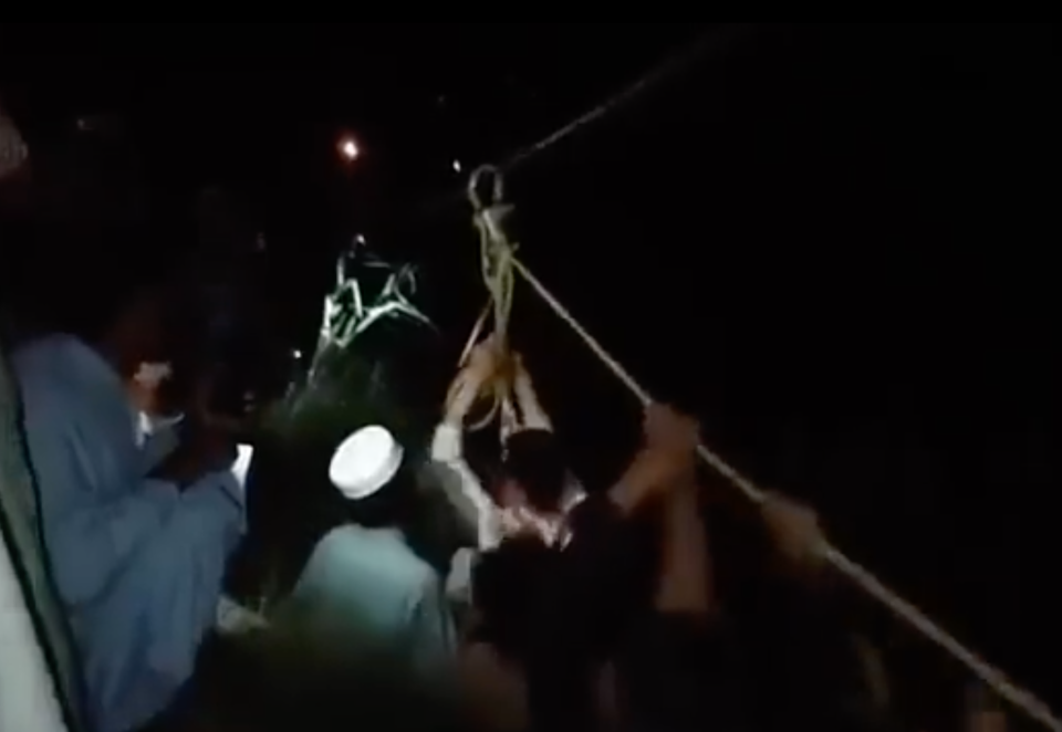 Footage showed an individual being pulled by hand along a wire, to which he was attached by harness (Twitter/X/screengrab/Amjad Ali)