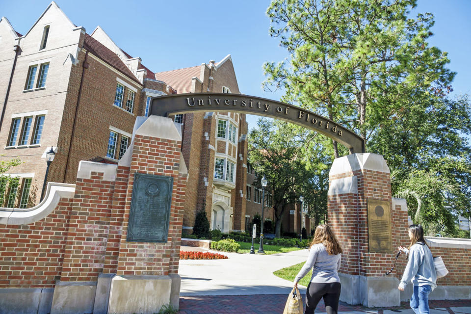 Gainesville, University of Florida, campus entrance with students (Jeff Greenberg / Universal Images Group via Getty Images)