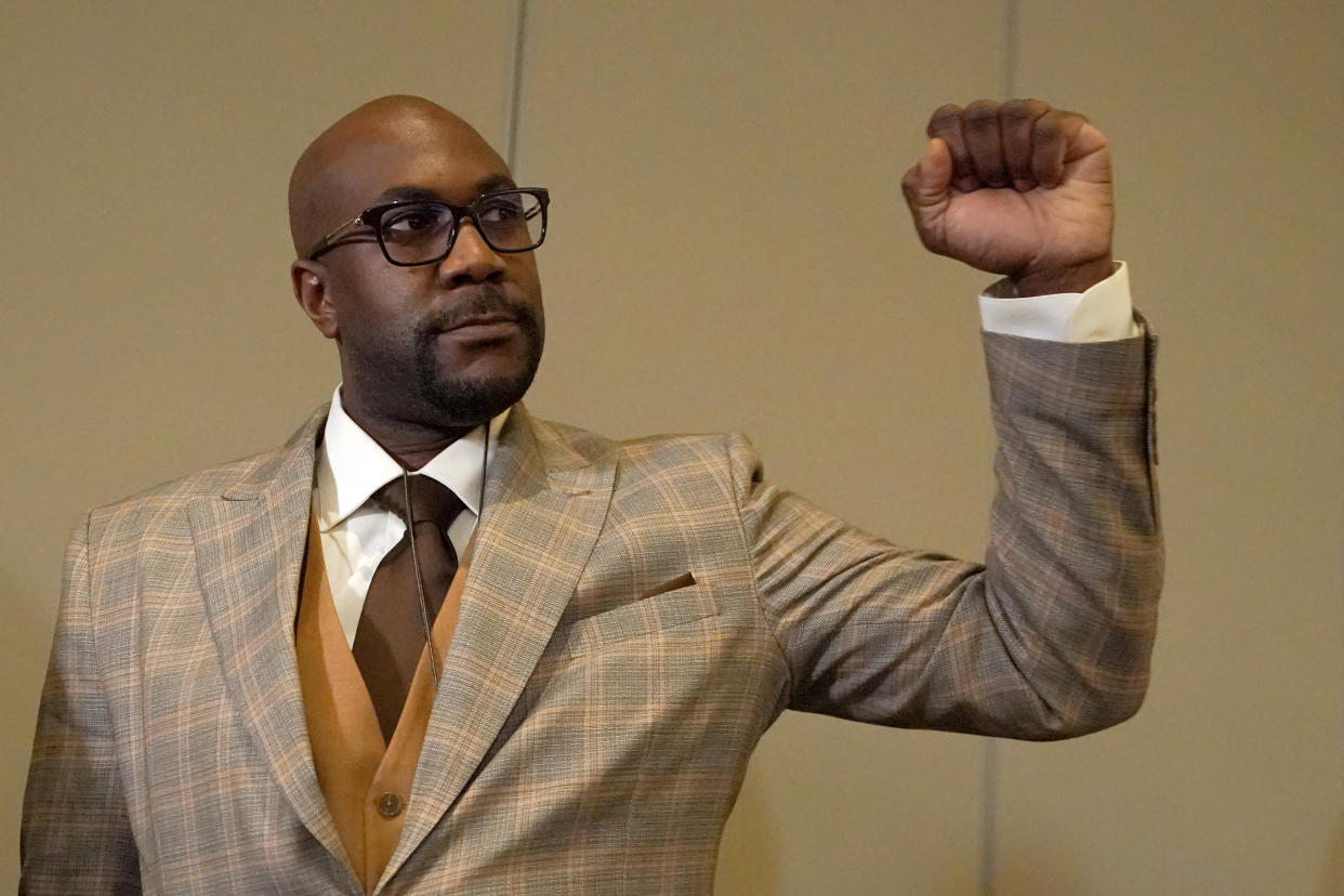 Philonise Floyd, brother of George Floyd, raises his fist following a news conference after the guilty verdict was read in the trial of former Minneapolis police Officer Derek Chauvin, Tuesday, April 20, 2021, in Minneapolis. (AP Photo/Julio Cortez)