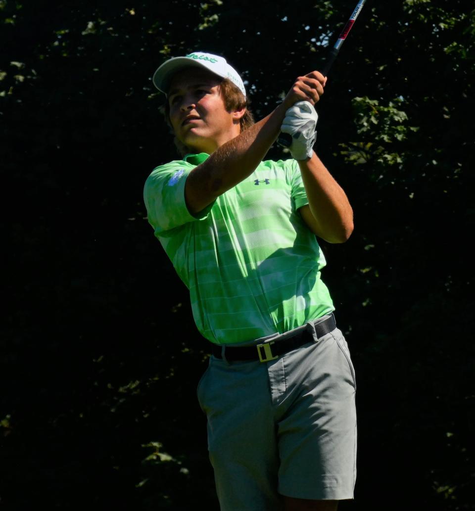 Newark Catholic junior Brian Luft watches his tee shot on No. 17 during the fourth and final Licking County League competition of the season at Denison Golf Club on Tuesday, Sept. 20, 2022.