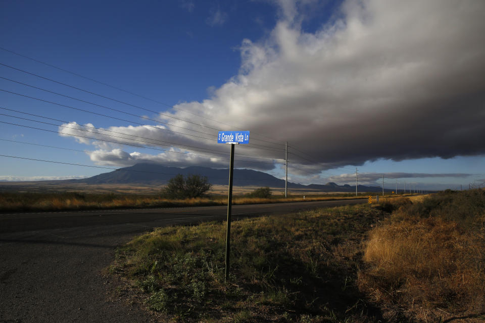 FILE - A street sign leads to what was once the home of Paul Adams and his family on the outskirts of Bisbee, Ariz., on Oct 26, 2021. An Arizona judge has ruled that the Church of Jesus Christ of Latter-day Saints may not use the state's “clergy-penitent privilege” to refuse to answer questions or turn over documents in a child sex-abuse case. (AP Photo/Dario Lopez-Mills, File)