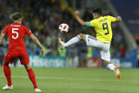 <p>Colombia’s Radamel Falcao, right, lunges for the ball against England’s John Stones during the round of 16 match between Colombia and England at the 2018 soccer World Cup in the Spartak Stadium, in Moscow, Russia, Tuesday, July 3, 2018. (AP Photo/Victor R. Caivano) </p>