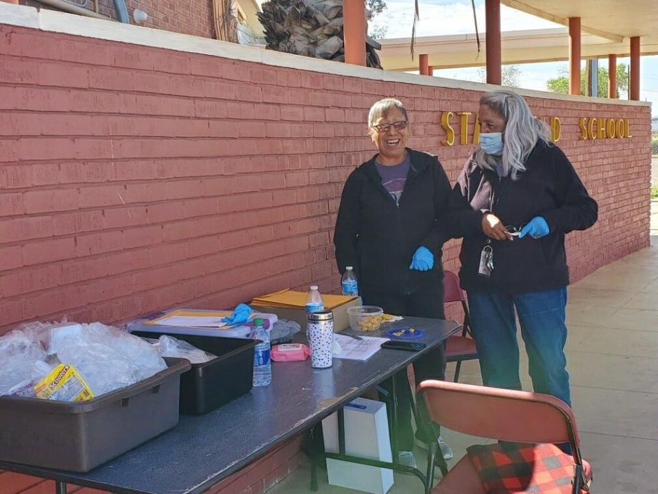 Stanfield School District paraprofessional Rose Gamez (left) and Kindergarten teacher Maria Garcia helped feed local children over the summer.